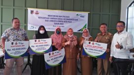 Pemkot Palu Serahkan Santunan JKM kepada Anggota Korpri. Foto: PaluPoso