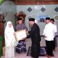 Kepala BPBD Sulteng Akris Fattah Yunus bersama Sekwan Daerah Siti Rachmi Amir Singi mengikuti Safari Ramadan di Donggala. Foto: DPRD Sulteng