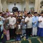 Santri Taman Pengajian Al-Qur'an (TPA) se-Kota Palu menerima bantuan dari Dewan Pengurus Daerah Badan Komunikasi Pemuda Remaja Masjid Indonesia (DPD BKPRMI) Kota Palu. Foto: istimewa