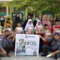 Yayasan Banua Amal Bersama distribusi program bantuan bernama Parcel Cinta di beberapa sekolah. Foto: Yayasan Banua Amal Bersama