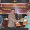 *Kapolda Sulteng Irjen Pol Agus Nugroho tanda tangan MOU dengan KPU Sulteng Misbah*