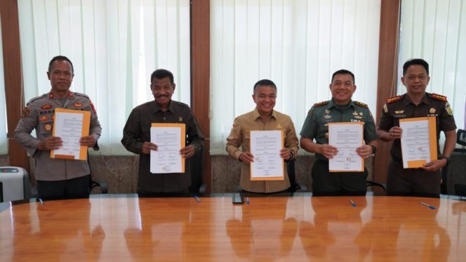 
 Penandatanganan nota kesepahaman pendapatan pajak daerah Kota Palu. Foto: Istimewa