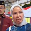Sekda Zulfinasran (kiri) dan Agustin Maria Tabondo, Sekretaris Badan Riset dan Inovasi Daerah Provinsi Sulawesi Tengah. Foto: Dok. Diskominfo Parigi Moutong 