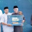 Wali Kota Palu bersama perwakilan Bank Indonesia Sulawesi Tengah secara simbolis meluncurkan program QRIS MANTAP – Palu Maju Bersama. Foto: Pemkot Palu 