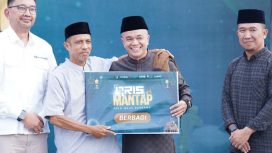 Wali Kota Palu bersama perwakilan Bank Indonesia Sulawesi Tengah secara simbolis meluncurkan program QRIS MANTAP – Palu Maju Bersama. Foto: Pemkot Palu 