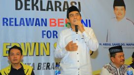 Erwin Burase: Dukungan Relawan BERANI Jadi Amunisi PSU Pilkada Parimo. Foto: Harry Mukti
