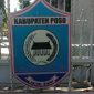 Lambang resmi Kabupaten Poso, Sulawesi Tengah, terpampang di gerbang kantor pemerintahan daerah. Filosofi 