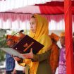 Wakil Wali Kota Palu Imelda Liliana Muhidin memimpin upacara Hari Keluarga Nasional (Harganas) ke-33 yang dirangkaikan dengan peluncuran Gerakan Edukasi dan Pendamping Inti Keluarga (Gemati) di Halaman Kantor Wali Kota Palu.